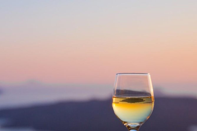 Santorini Wine Adventure with 12 Wine Tastings, Tapas and Sunset - Pickup, group size, and how the day stays social