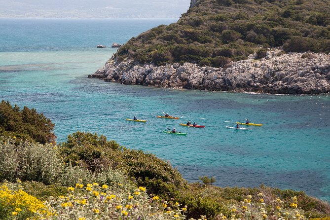 Sea Kayaking in Navarino Bay - The monolithic islet, natural stone arch, and bird life
