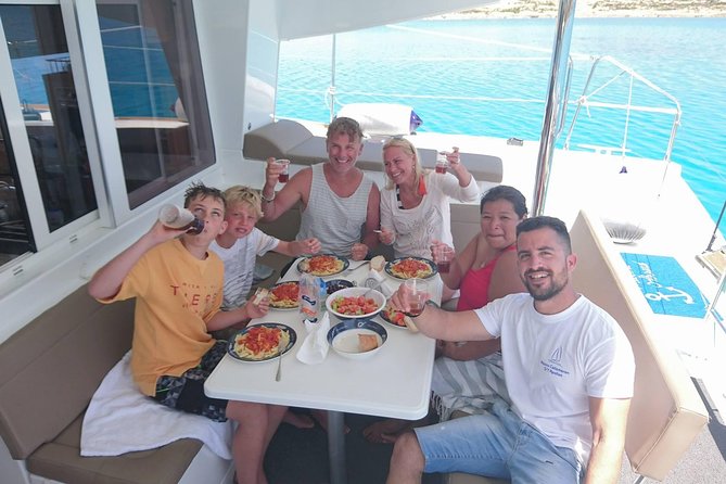 Shared Catamaran All inclusive-Day Cruise to Naxos or Paros - Views and Beach Time: Why Secluded Coves Beat a Shore-Walk Day