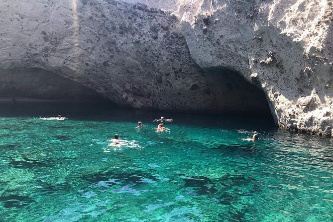 Small Group Kaiki Cruise & Greek Gastronomy Experience - Antiparos stretch: rock formations, coves, and easy snorkeling time