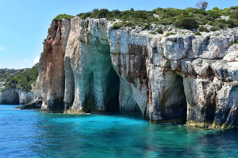 Zakynthos: Blue Caves and Navagio Bay Swim Cruise - Agios Andreas Bay swim stop: clear water with an easy first hop in