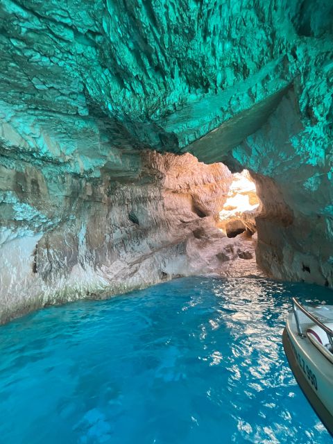 Zakynthos: Glass-Bottom Boat to Navagio, Caves & White Beach - White Beach: pebbles, sun, and a friendly rock-tower challenge