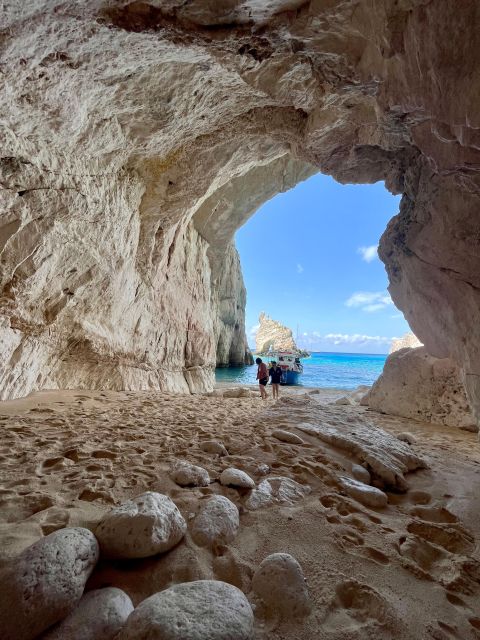 Zakynthos: Glass-Bottom Boat to Navagio, Caves & White Beach - Old Olive Tree stop: wine, snacks, and shopping breaks