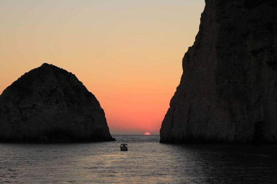 Zakynthos: Mizithres Sunset Cruise with Swimming & Turtles - Getting Onboard: Agios Sostis Harbor and the Nautilos Flag