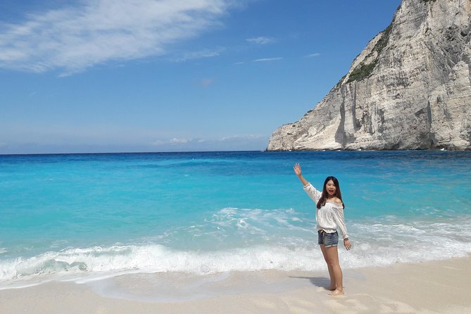 Zakynthos : One day small group tour to Navagio beach Blue Caves & top view - Blue Caves: boat time, possible glass-bottom, and swim breaks