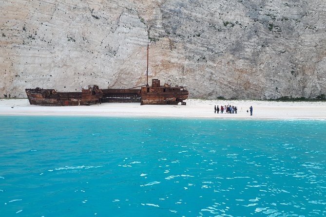 Zakynthos : One day small group tour to Navagio beach Blue Caves & top view - Sfogio, Golden, White, and Maravelia Cave: the backup plan and the extra swim bonus